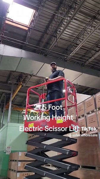 Electric Scissor Lift From SaferWholesale. #scissorlift #Electric #itselectric #electricmanlift #manlift #manlifts #amazing #callus #saferwholesale #Renegade #high #funny #fyp #cool #howto #work #warehouse #working