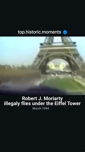 Top Historic Moments on Instagram: "Former US Marine fighter pilot Moriarty was part of a team taking part in the 'Paris to Libreville' air race, but an engine failure south of Portugal forced him to drop out. After repairing the plane, he turned his attention to the Eiffel Tower. When asked why he had done it, he replied: "Just for fun". #flying #illegal #flyinghigh #eiffel #towers #planes #navy #robert #ad #tophistoric #danger"