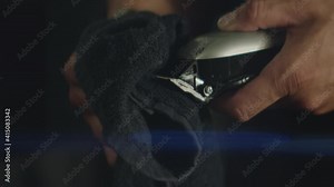 Close up of someone cleaning a razor