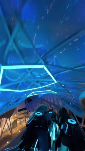Experience the Thrilling Tron Lightcycle Run at Night!
