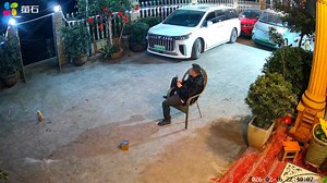 Firecracker prank startles man and explodes under parked vehicle in Chongqing, China