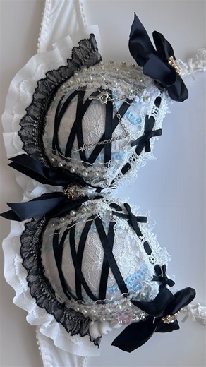 miranda wang on Instagram: "we recreated another version of our viral alice in wonderland rave bra 🩵 commissions are open! #raveoutfit #ravefashion #ravegirls #diy"