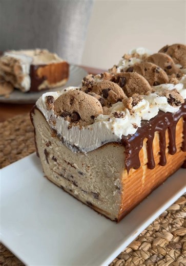 Chocolate Chip Cookie Basque Cheesecake Recipe 🍪 RECIPE: CHEESECAKE: 1.5 cups heavy cream 10 chocolate chip cookies 3 blocks (24 oz) softened cream cheese 1/2 cup sugar 3 eggs 1 tsp vanilla 1.5 tbsp flour 1 tsp cornstarch WHIPPED CREAM: 4 oz mascarpone cheese 1 cup heavy whipping cream 1/4 cup powdered sugar GANACHE: 1/2 cup heavy cream 1 cup milk chocolate chips process: 1. Preheat the oven to 450F. 2. Soak the cookies inside the heavy cream 3. Combine the soft cream cheese, sugar, vanilla, an