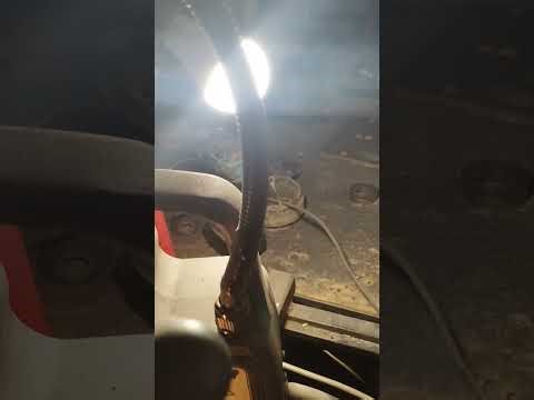 Self-powered flywheel generator