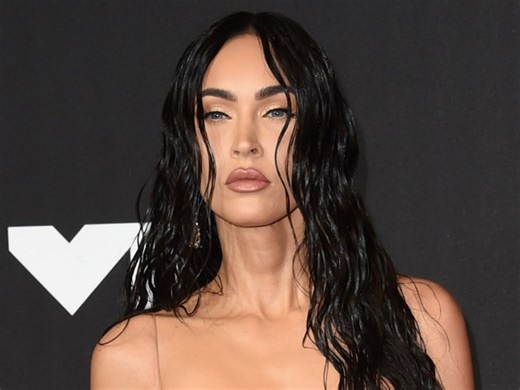 Megan Fox Looks Like a Gothic Goddess as She Shows off Her Baby Bump in Barely-There Lace Gown