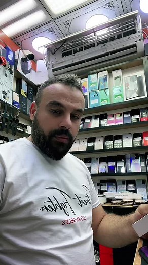 Unboxing the Latest Smartphone in an Electronics Store