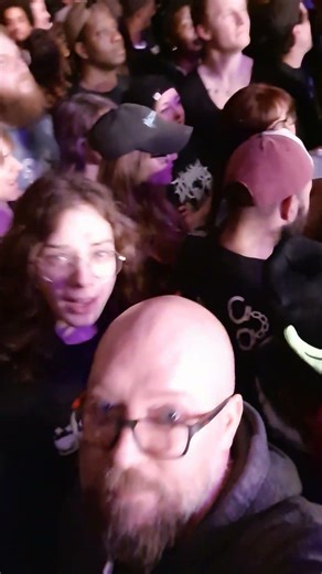 When everyone is vibing to Miley between sets at the metal show.