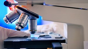 Laboratory Worker Adjusts Zoom Microscope Stock Footage SBV-311703400 - Storyblocks