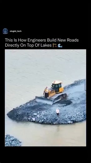 science& technology on Instagram: "This is how engineers create real, driveable roads in places where there was never land at all. 🌍⚙️ The process starts by dumping massive volumes of rock and aggregate directly into the water, forming a stable base that displaces soft sediment and spreads weight evenly across the lakebed. Heavy machinery then compacts each layer, forcing water out and locking the stones together through friction and pressure. Once the base reaches the surface, engineers add gr