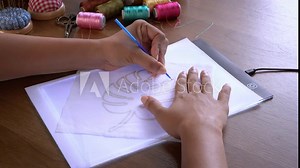 The Art of Pattern Transfer: Using a Lightbox in Embroidery