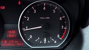 Car rev counter gauge and needle. Revving the engine up to red line limiter. Close up, real time, sound, no people