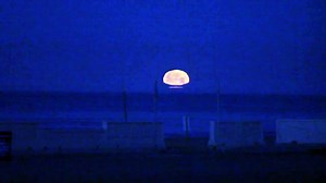 Stunning full moon setting