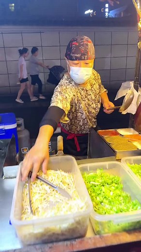 Delicious Street Food: Spicy Noodle Dish Preparation