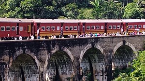 COLOMBO FORT EXPRESS TRAIN PASSING OVER THE WORLD FAMOUS ELLA NINE ARCH BRIDGE. | Indika Weerakoon
