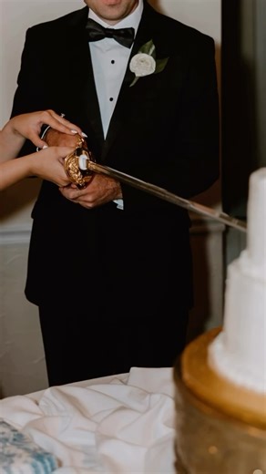 Atlanta Wedding Photographer on Instagram: "POV: you cut your wedding cake with a sword 🗡️ #atlantaweddingphotographer #gaweddingphotographer #atlantaphotographer"