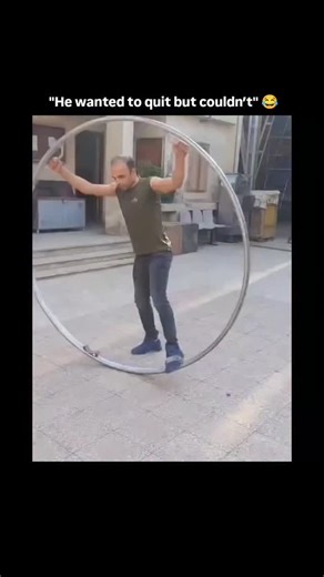 Find Best Song / Music on Instagram: "This footage documents a training attempt involving a Cyr wheel, a monolithic acrobatic apparatus, where the operator's initial rotational momentum escalates into an uncontrolled high-velocity spin due to a shift in the center of gravity. The visual narrative captures the subject's struggle to counteract the overwhelming centrifugal force, resulting in a chaotic sequence of flailing limbs and disoriented revolutions before he manages a clumsy deceleration an