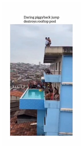 guffvibes on Instagram: "This video captures a dramatic and catastrophic structural failure of a rooftop swimming pool. It is a viral clip that often circulates as a cautionary tale regarding engineering and weight limits. Video Summary The footage shows a high-rise building where a group of people are gathered around a small, cantilevered infinity pool (a pool that sticks out from the side of the building). The Incident: Two men perform a "piggyback jump" from a higher floor directly into the p