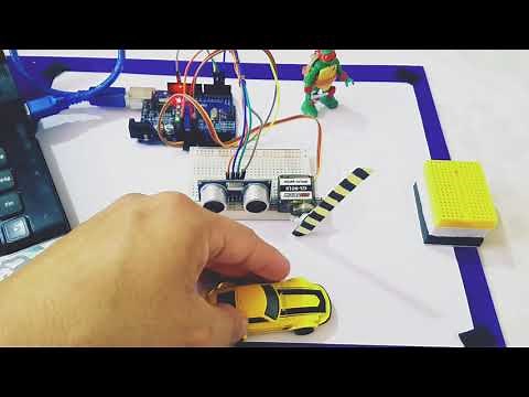 pluma de estacionamiento con sensor de proximidad en arduino