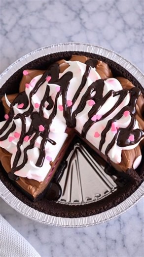 🍒 Valentine Chocolate Cherry Fudge Pie This Valentine Chocolate Cherry Fudge Pie is my idea of pure chocolatey romance in a crust. Thick, creamy chocolate filling, a sweet swirl of cherries through the middle, a fluffy whipped topping cloud, and a glossy hot fudge drip over the top… it looks like something from a fancy dessert case but it’s secretly so simple. With Valentine’s Day in the air, this is the pie I love to pull from the fridge after dinner and watch everyone fall quiet on that first