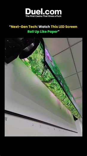 The Curious Core on Instagram: "Watch this innovative rollable LED display in action as it bends, curves, and smoothly rolls up without losing brightness or clarity. This flexible screen showcases the next step in display technology—lightweight, portable, and stunningly versatile. Perfect for futuristic setups, portable advertising, and creative installations, this rollable LED panel proves that the future of screens is flexible."