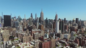 Empire State's Majesty: Aerial Night Scenes Over Manhattan