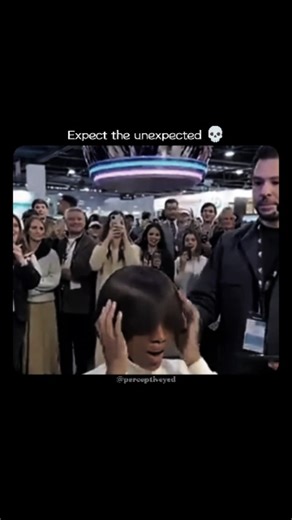 Perceptive | Viral Reels on Instagram: "The post features a viral demo of Dubai's AI Hair Dome at a tech expo, where a large afro is transformed into sleek, straight hair in under 10 seconds using automated heat and AI-guided styling, eliciting shocked delight from the participant. Viewer reactions, mostly in Indonesian, express awe at the "magical" speed and softness, with over 38,000 views and 55 replies in 24 hours, underscoring global fascination with accessible, damage-free hair transformat
