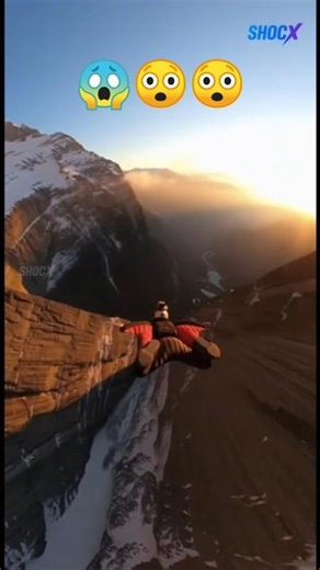 Skydive between mountain passes 😱 | GoPro captures unbelievable near-miss moment