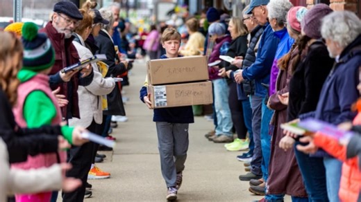 'Book by book': Michigan community takes novel approach moving local bookstore