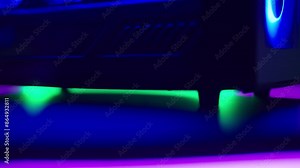 RGB gaming computer case feet on turning platform close-up 4K