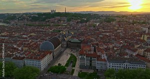 Lyon historical city center with streets aerial drone video footage. Warm summer evening. Sunlight Lyon aerial Lyon France. Famous tourist holiday vacation destination in France, Europe