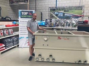 De werking en installatie van een trommelfilter bij TOP Koistore