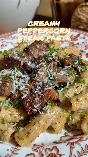 Ashley Breann on Instagram: "THIS IS DINNER… CREAMY PEPPERCORN STEAK PASTA. Comment “STEAK” or “PASTA” and I’ll DM you the recipe🤍 My new favorite pasta recipe 🤌🏾 a creamy peppercorn sauce sauce tossed with rigatoni and topped with juicy rib eye steak bites, chives and parmesan. It’s peppery it rich, it silky, and adding a drizzle of truffle oil truly takes it over the top. The perfect quick and easy weeknight dinner. This one definitely going on repeat."