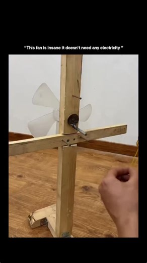 Mindblownix™ on Instagram: "At first glance, this looks impossible, a fan spinning with no wires, no batteries, and no power source at all.⚙️🌀 Instead of relying on outlets or electronics, this design converts stored mechanical energy into motion using simple components like tension, gearing, and rotational transfer. When force is released, potential energy becomes continuous movement, spinning the blades with no electrical input. Designs like this are essential especially in environments with