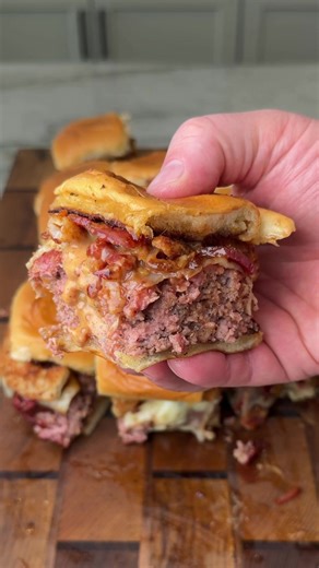 BBQ Cheeseburger Sliders These are perfect for a busy week or game day! Recipe • In a bowl, combine 1 1/2lb burger, 1/2c mayo, 1 tbsp mustard, 1/4c bread crumb, 1 egg and 2 tbsp bbq rub. Hand Mix thoroughly with a glove until fully combined. • Remove the slider buns from the packaging then stuff the meat mixture into the white tray it comes in. • Evenly spread the meat out then transfer it to an oiled wire rack. • Insert the @MEATER Pro to monitor the internal temp of the beef. (Finished at 155F
