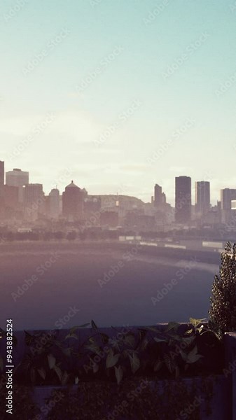 wide-angle view of the city, showcasing tall buildings and bustling activity from a high-rise perspective.