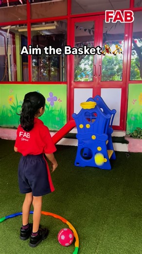 Fab Play School Amroli on Instagram: "This 'Aim the Basket' activity is perfect for building confidence and helping kids focus on what they're doing."