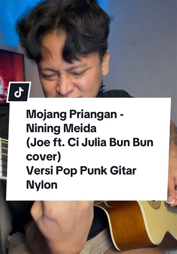 Replying to @gibranpratama503 LUNAS MY FRENN, semoga terhibur 😁🙏🏻. Lagu: Mojang Priangan - Nining Meida (Joe Python ft. @Ci Jul Bun Bun cover) Versi Pop Punk Gitar Nylon. Izin cover teh @Nining Meida Officia 😍❤️🙏🏻. Gitar: AR-NC 01 @Artisan Guitar Indonesia . Mojang Priangan cover. #mojangpriangan #poppunk #coverlagu #fyp