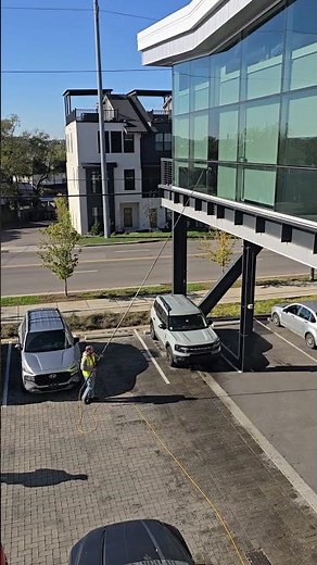 Cleaning Commercial Windows with Water-fed Pole
