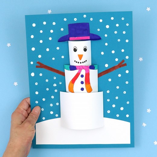 Make a 3D paper snowman scene, surrounded by falling snow! Get the template here: https://www.thecrafttrain.com/3d-paper-snowman/ | The Craft Train