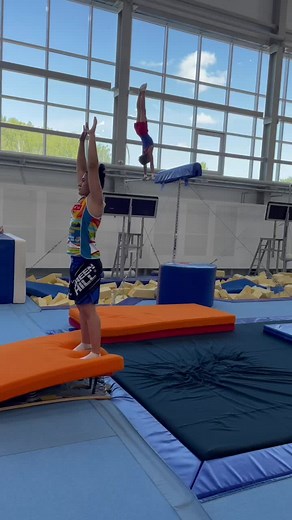 Gymnastics Training Session: Balance Beam and Springboard