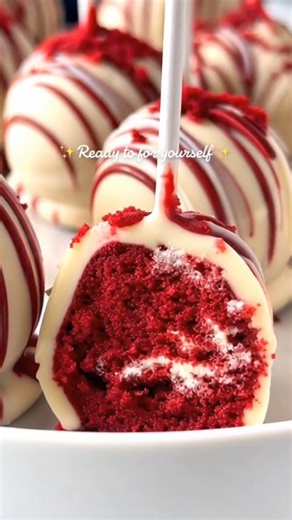 🍰 Red Velvet Cake Pops | Rich, fudgy bites dipped in creamy bliss 🤍 These red velvet cake pops are pure bakery magic in bite-sized form. Moist, velvety cake mixed with creamy frosting, rolled into soft little balls, then dipped in a smooth white coating that cracks just slightly when you bite in. They feel festive, indulgent, and special, like the kind of treat you bring out for celebrations or make when you want something fun that feels straight from a professional bakery. That deep red cente