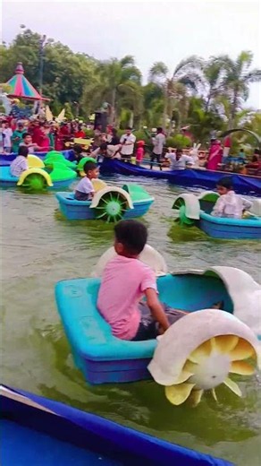 Kids having fun, smiles everywhere💙#KidsFun #BoatRide #FamilyTime #ParkAdventure #KidsActivities