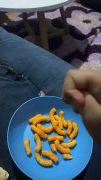 SB Short: Shark Puppet Eats Cheetos puffs