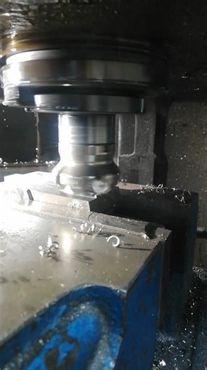 ON MILLING MACHINE WITH ROUGH CUTS GETTING STEEL SPECIMEN READY FOR MACROSTRUCTURE EVALUATION
