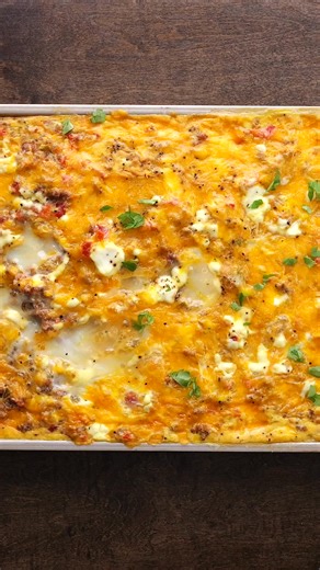 Rotel Sausage & Cream Cheese Sheet Pan Breakfast Casserole is packed with hash browns, sausage, Rotel tomatoes, cream cheese, eggs, and melty cheese—all baked in one easy pan. Perfect for make-ahead weekends, holidays, or feeding a crowd without the fuss. 🥘🧀⁠ ⁠ ✨Comment RECIPE and I will DM you the link to the recipe✨⁠ ⁠ 🔗 https://www.plainchicken.com/rotel-sausage-sheet-pan-breakfast-casserole/ | Plain Chicken