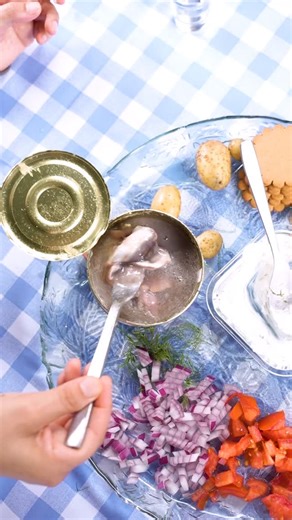 2.8K views · 20 reactions | Is surströmming really that stinky? This fermented fish, a longstanding Swedish delicacy, is infamous for its distinctively strong aroma. It’s salty, smelly, and entirely Swedish. Watch ASI staff and members try it out for themselves! Accompanied by the traditional spread of boiled potatoes, raw red onions, sour cream, and dill, it’s deemed “not that bad.” #surströmming #sweden #swedish #stinkyfish | American Swedish Institute | Facebook