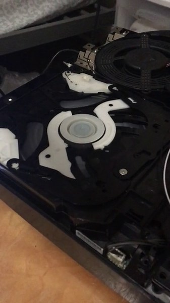 PS3 making weird type writer like noise when playing games from the optical drive (disc). Please help (more info in the comments)