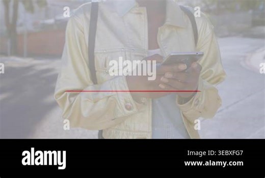 Animation of text quarantine over triangle with woman in face mask using smartphone in city. Global covid pandemic warning concept digitally generated video Stock Video Footage - Alamy