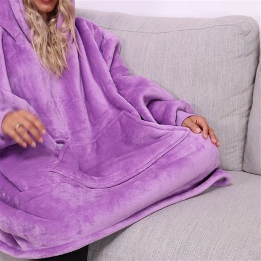 The Snuggie® Hoodie is a wearable blanket sweatshirt with an oversized Kangaroo pocket, too! #Snuggie #SnuggieHoodie | Snuggie Blanket