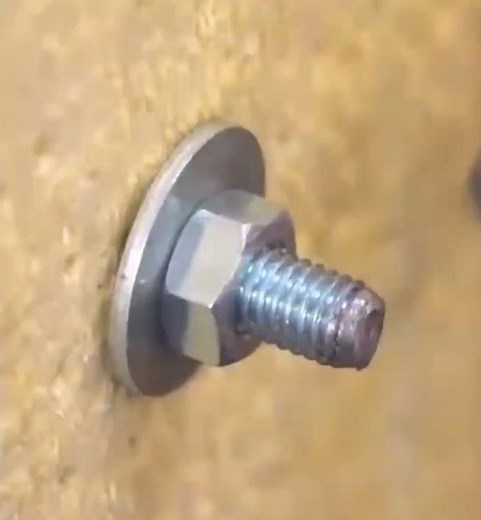 Here's how to tighten a nut on a bolt thread using a special wrench.